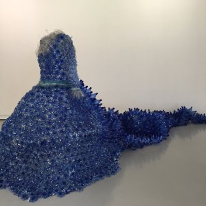 This was pretty cool. A dress made of plastic bottle bottoms and the train was whole bottles. Wearable Art!
